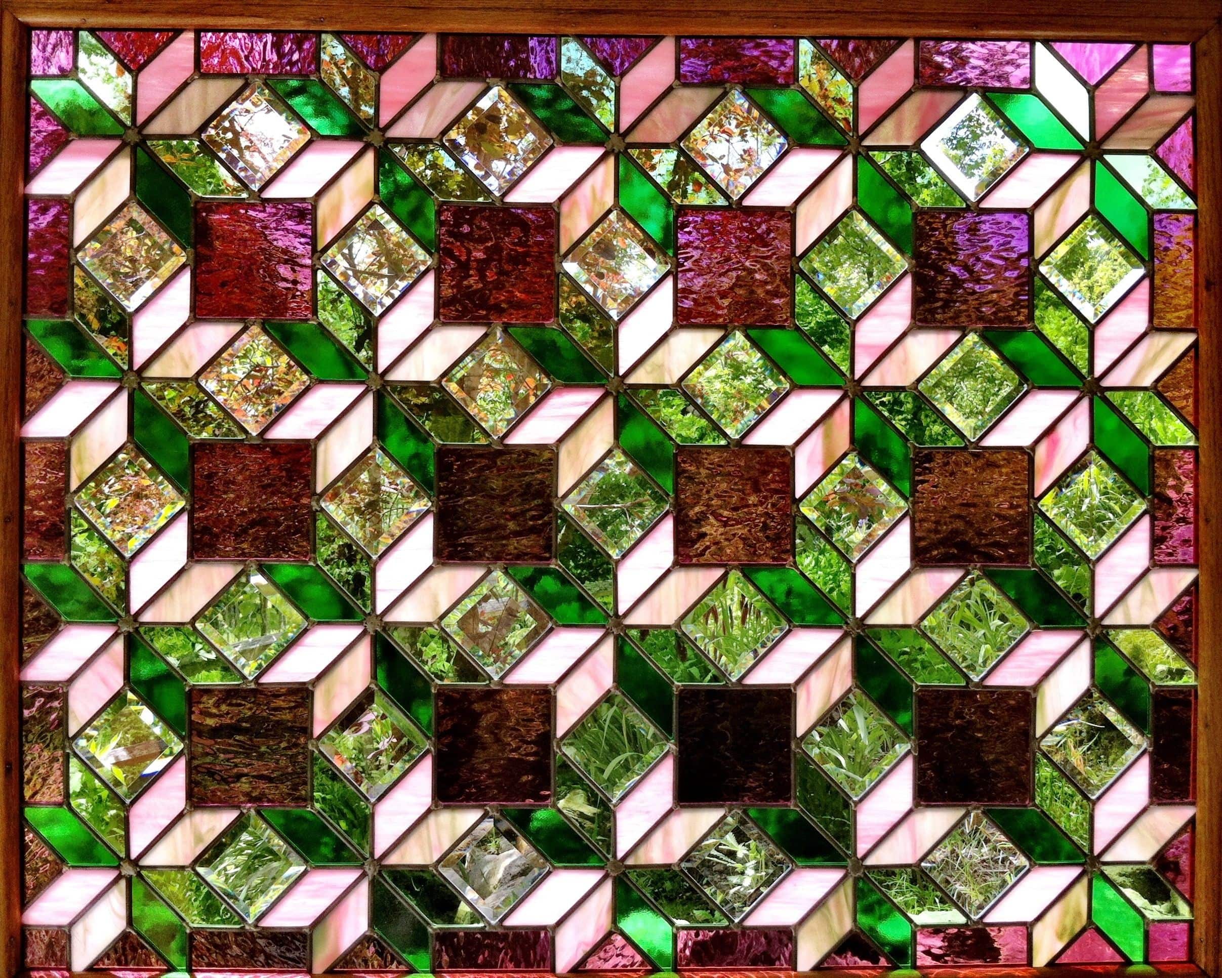 Ohio Star quilt pattern, 4x5 blocks, in green, pink, & purple stained glass, with  bevels.