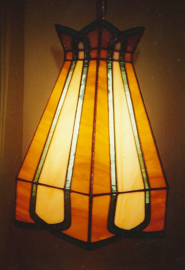 6 -sided amber, tan and blue hanging stained glass lamp